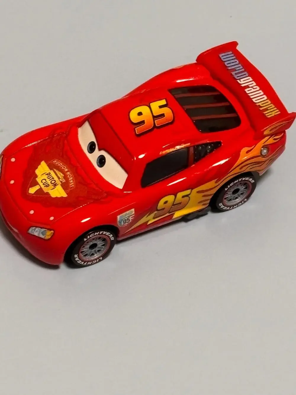 Disney Pixar Cars 2 Lightning McQueen Diecast Piston Cup World Grand Prix